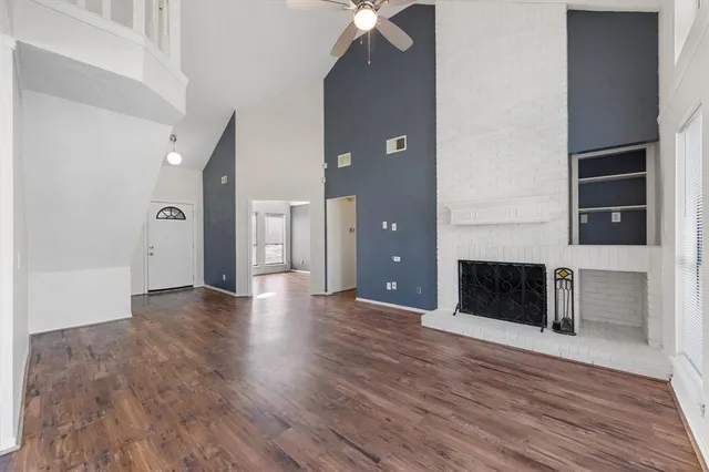 a view of a livingroom with wooden floor
