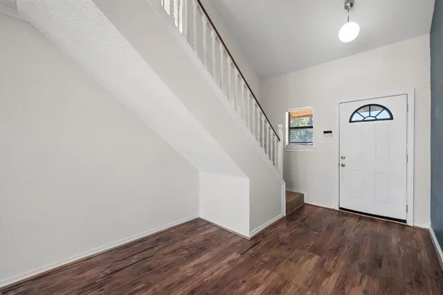 a view of entryway with wooden floor