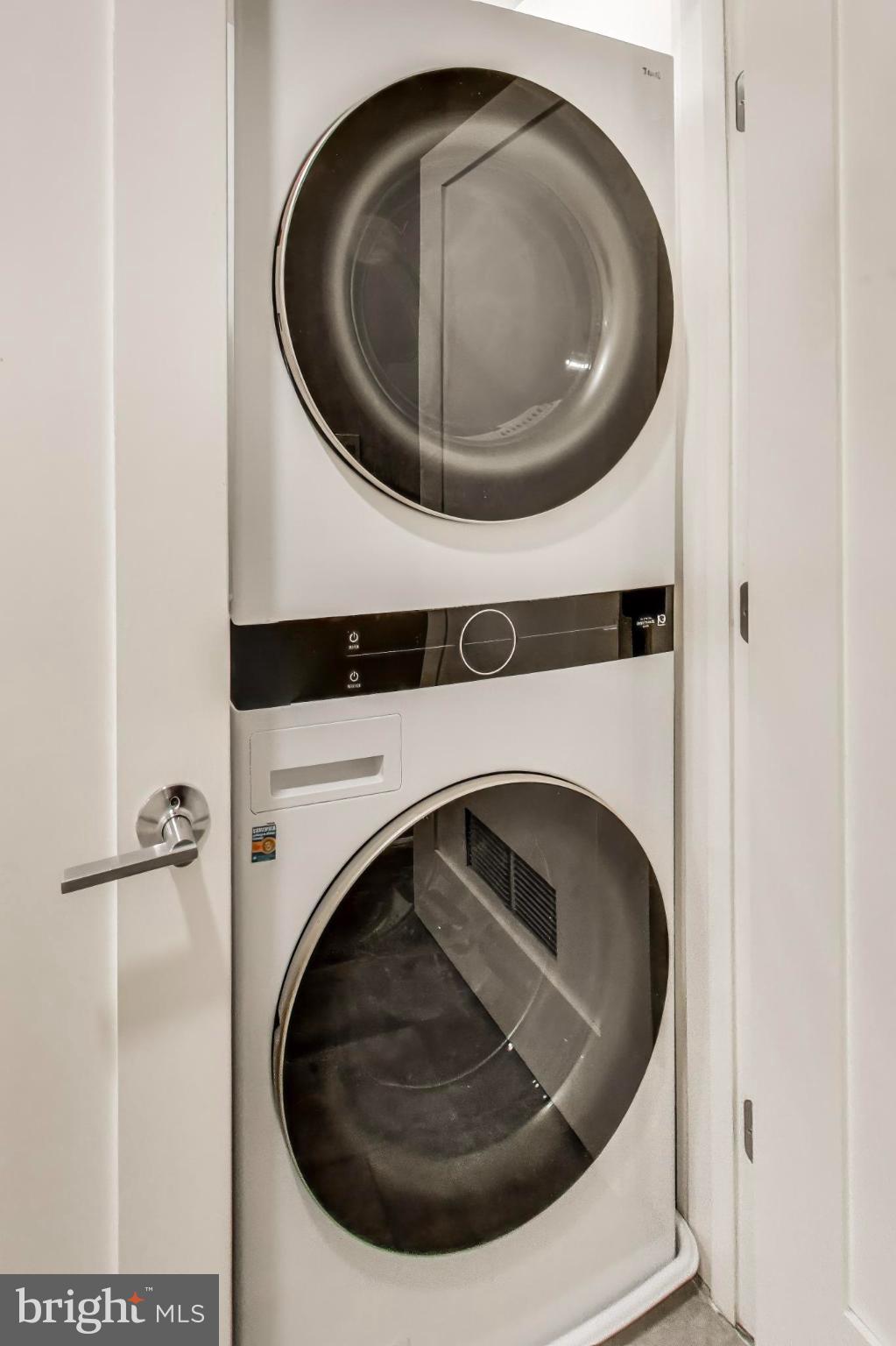 1444 Harvard Street Northwest, Unit 1 Washington, DC 20009 - Photo 16 of 19 Sleek laundry duo for modern living spaces.