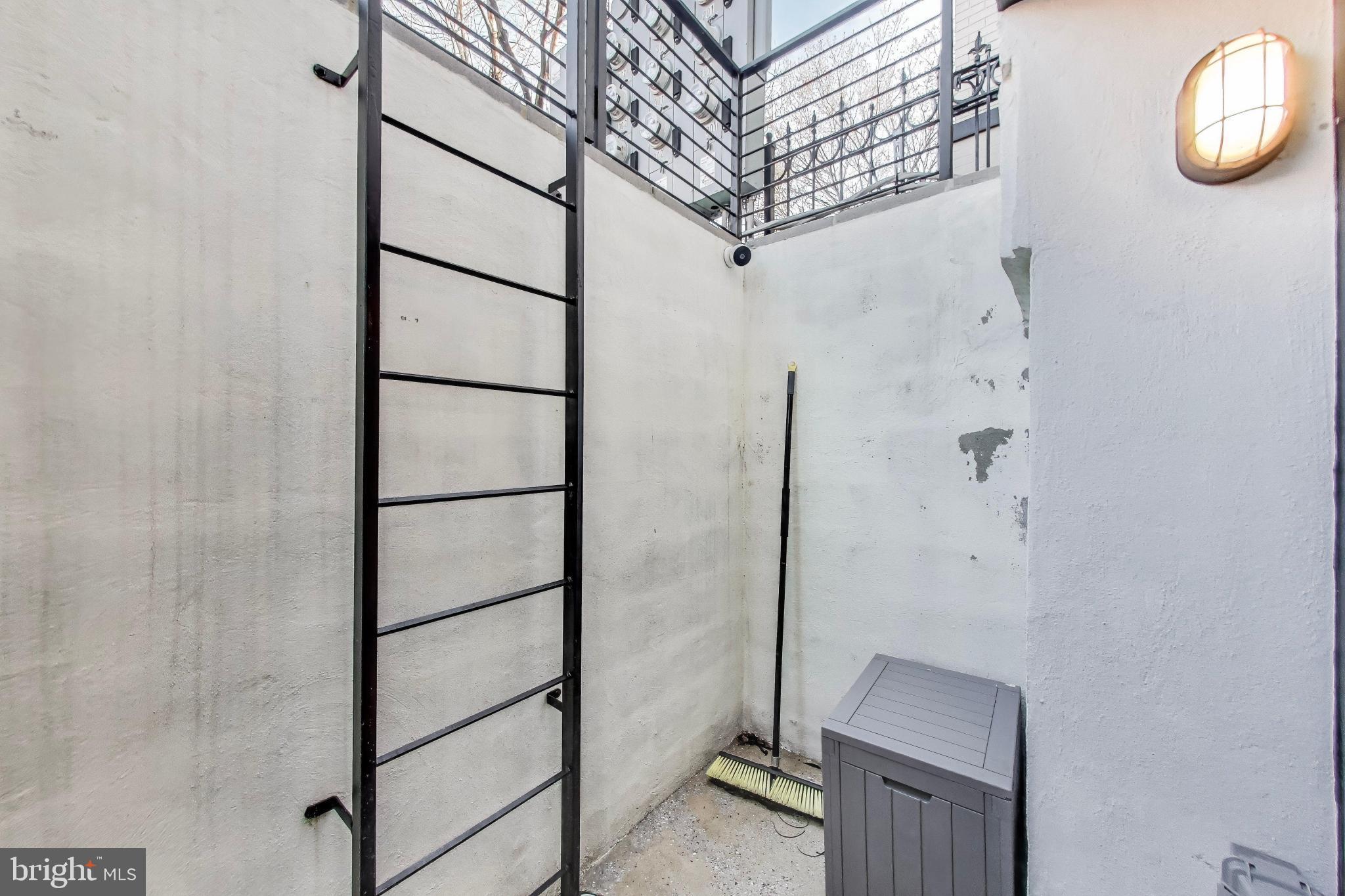 1444 Harvard Street Northwest, Unit 1 Washington, DC 20009 - Photo 17 of 19 Urban retreat with a private ladder access.