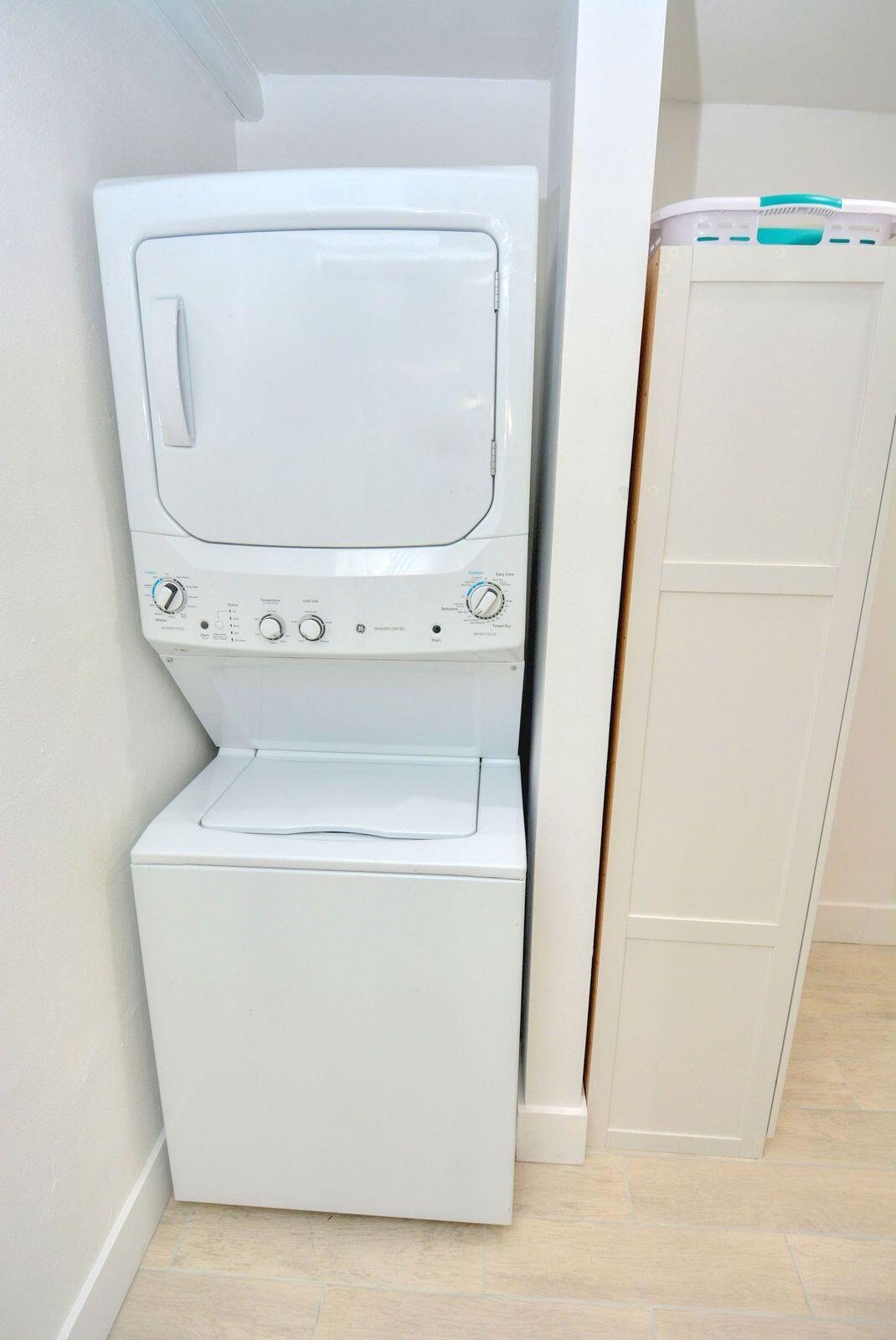 1315 Northeast Flora Place Jensen Beach, FL 34957 - Photo 20 of 27 a utility room with dryer and washer