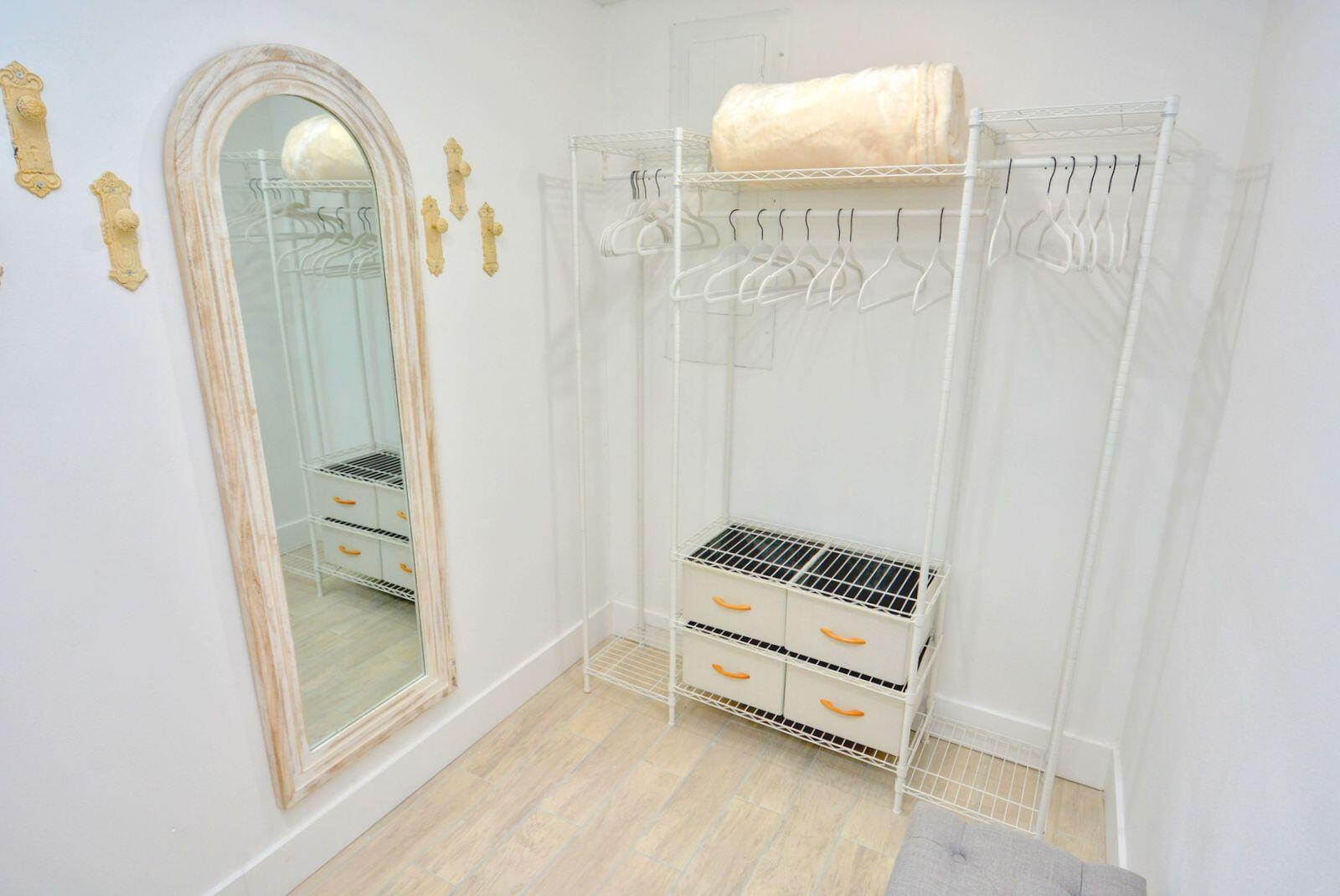 1315 Northeast Flora Place Jensen Beach, FL 34957 - Photo 21 of 27 a view of a room with front door