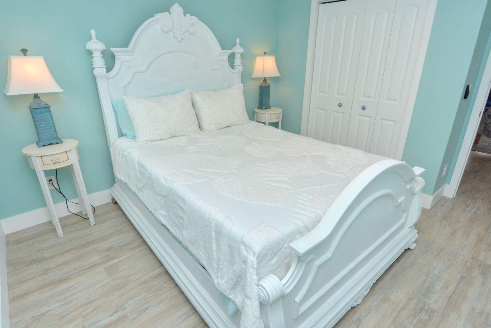 1315 Northeast Flora Place Jensen Beach, FL 34957 - Photo 23 of 27 a large white bed in a white room