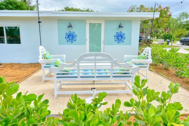 a view of a swimming pool with a lounge chair