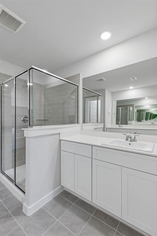769 Sierra Ridge Lavon, TX 75166 - Photo 24 of 37 Primary Bathroom in the Harrison home plan by Trophy Signature Homes – REPRESENTATIVE PHOTO