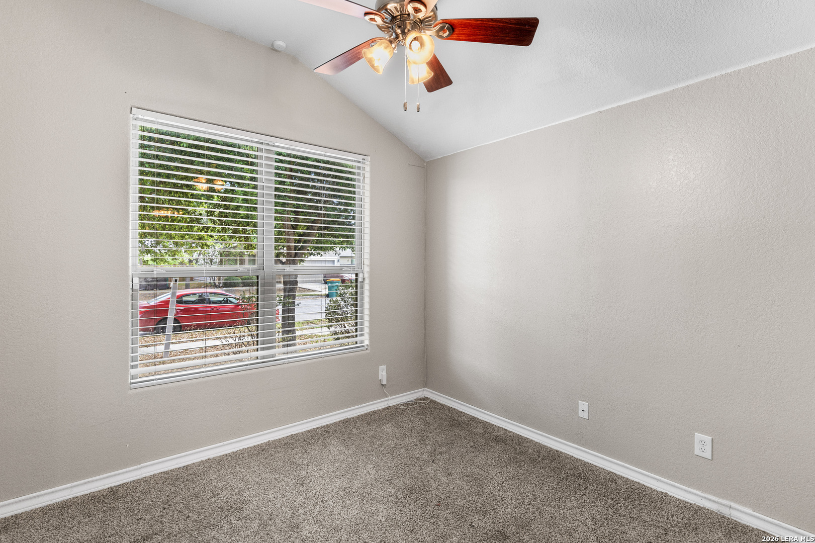 10421 Macarthur Way Converse, TX 78109 - Photo 5 of 26 a view of an empty room with a window