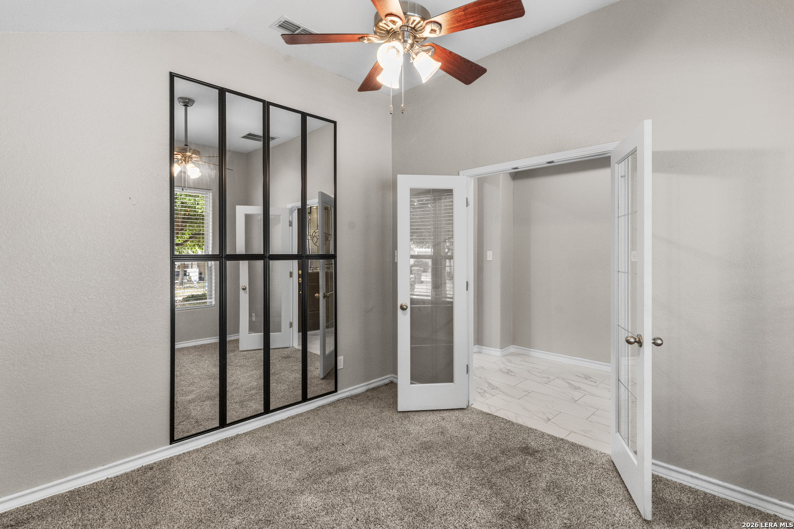 10421 Macarthur Way Converse, TX 78109 - Photo 6 of 26 a view of entryway with chandelier fan
