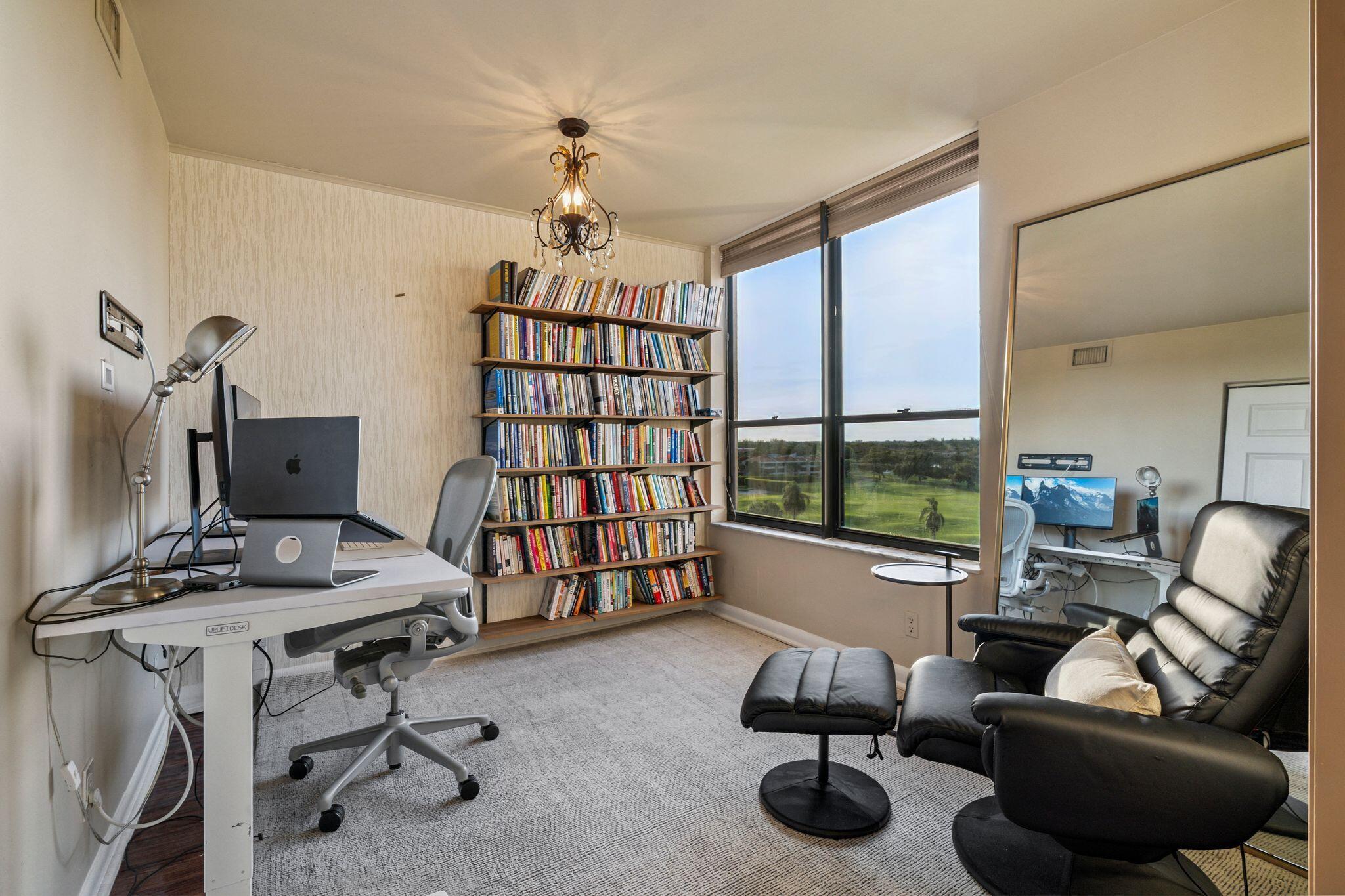 7217 Promenade Drive, Unit 801 Boca Raton, FL 33433 - Photo 18 of 39 a livingroom with workspace and a window