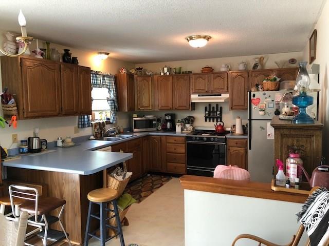 681 Hudson Road Glenburn, ME 04401 - Photo 8 of 34 Kitchen with gas stove.