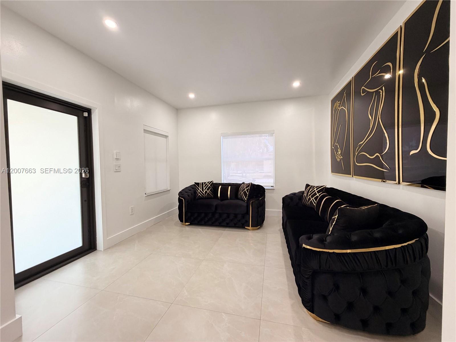 86 Northwest 4th Street Homestead, FL 33030 - Photo 3 of 22 a living room with furniture