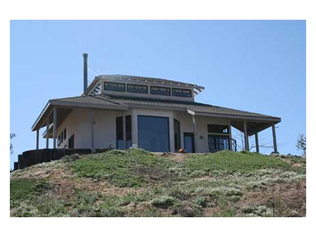 20944 Windle View Road Ramona, CA 92065 - Photo 14 of 25 Back of home with wrap around covered porch to sit and enjoy the view