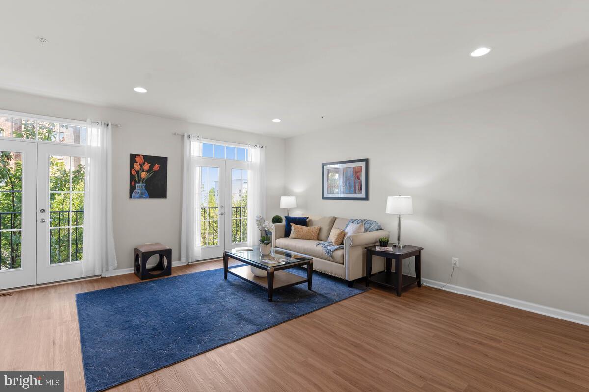 2145 Little Sorrel Way Silver Spring, MD 20902 - Photo 4 of 39 Large open airy living room with French doors