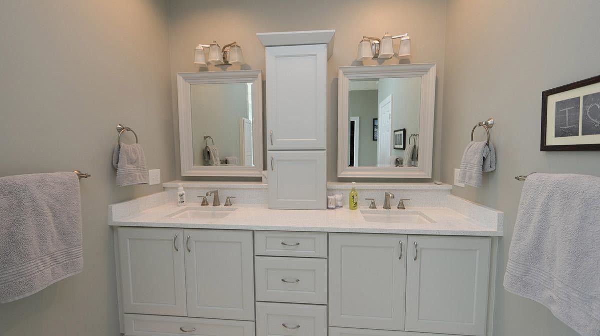 3820 Evander Way Raleigh, NC 27613 - Photo 20 of 30 The gorgeous vanity has lots of storage -drawers and cabinets. There is a quartz countertop & framed mirrors. Master Bathroom Vanity