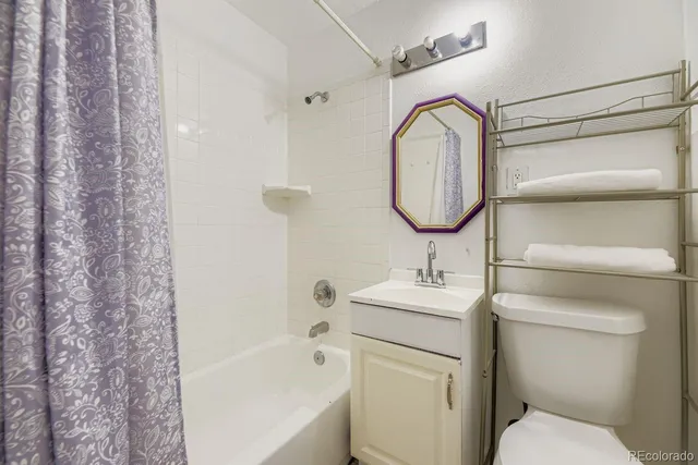 a storage room with furniture and a window