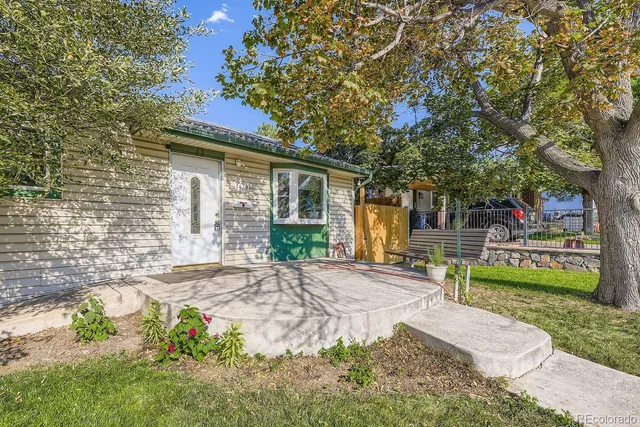 a kitchen with cabinets appliances and a window