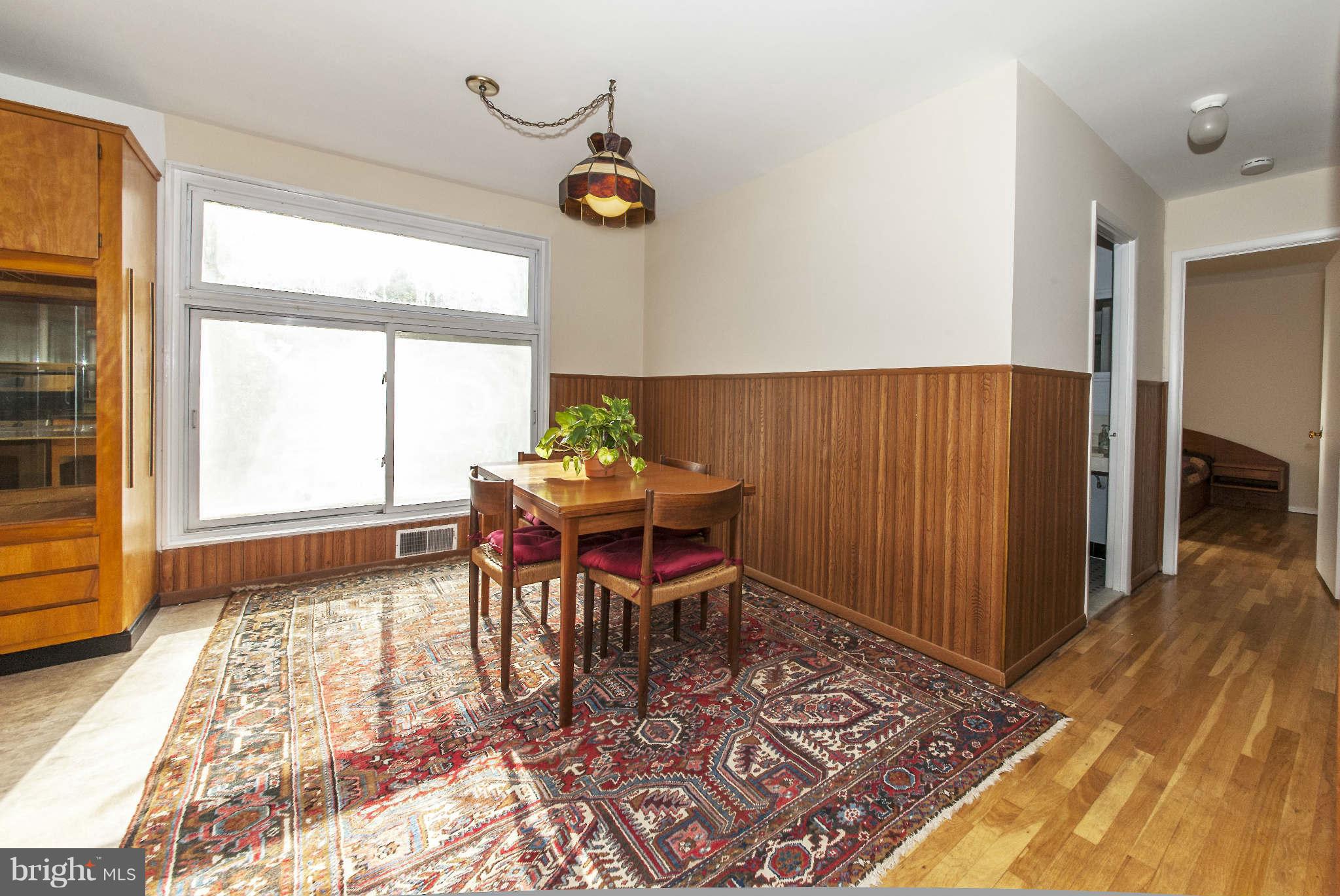 4014 Highview Drive Silver Spring, MD 20906 - Photo 7 of 22 a view of a dining room with furniture and a window