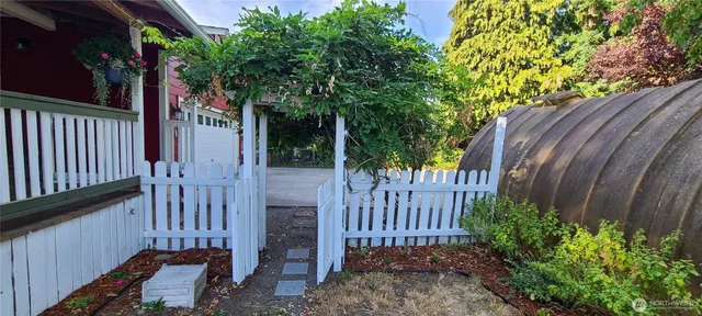 a view of a porch with a garden