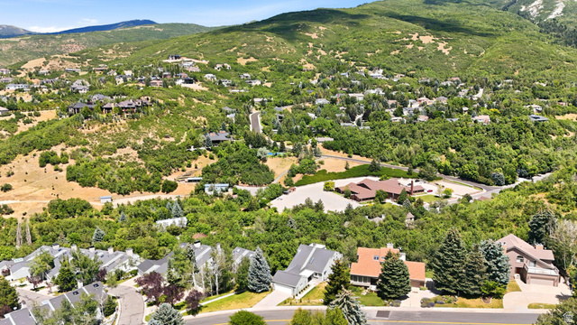 1979 Cave Hollow Way Bountiful, UT 84010 - Photo 50 of 59 Expansive mountain landscape featuring residential properties nestled among abundant green foliage
