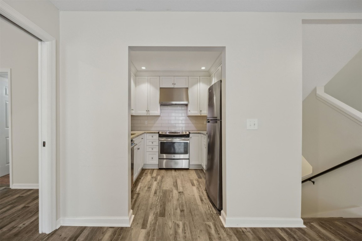 4734 Gulf Stream Court, Unit 9 Fernandina Beach, FL 32034 - Photo 13 of 32 a view of a kitchen from the hallway