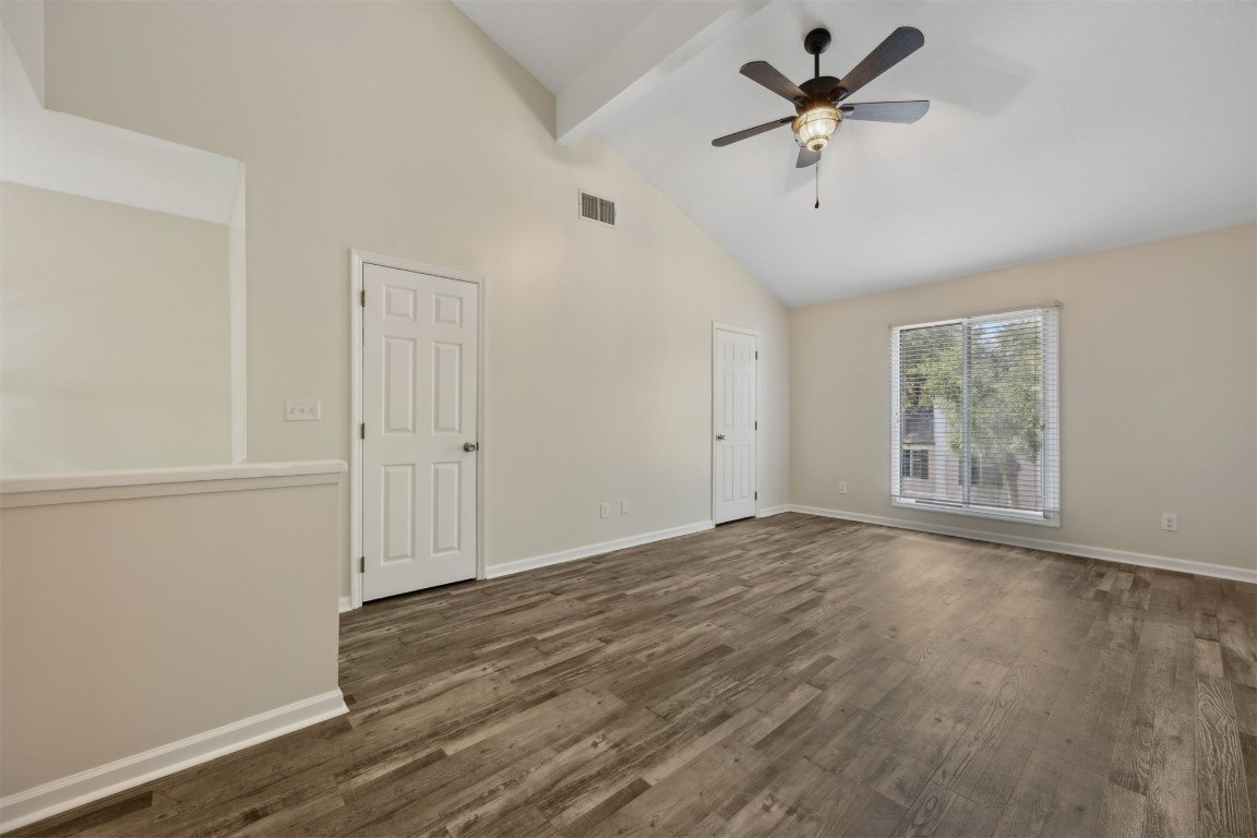 4734 Gulf Stream Court, Unit 9 Fernandina Beach, FL 32034 - Photo 18 of 32 wooden floor in an empty room with a window