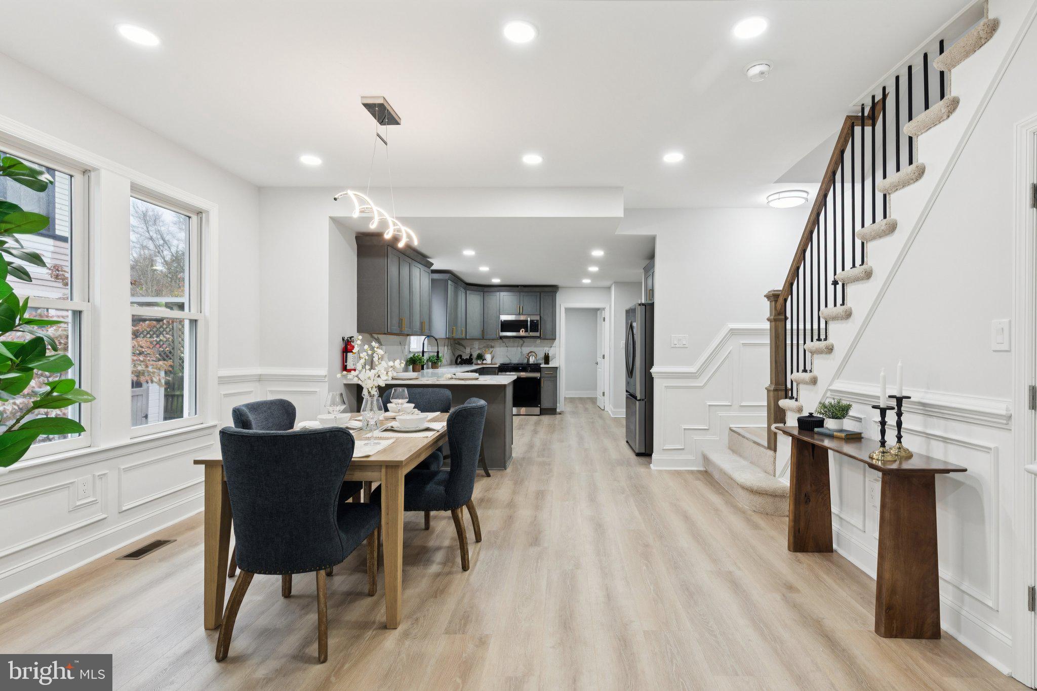 125 West Summit Avenue Haddonfield, NJ 08033 - Photo 14 of 68 a view of a dining room with furniture and a kitchen
