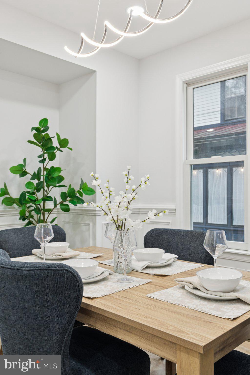 125 West Summit Avenue Haddonfield, NJ 08033 - Photo 18 of 68 a view of a dining room with furniture and a potted plant