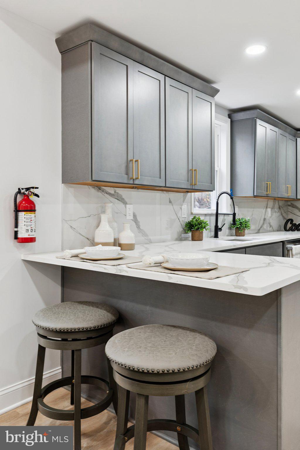 125 West Summit Avenue Haddonfield, NJ 08033 - Photo 21 of 68 a kitchen with a sink a table and chair