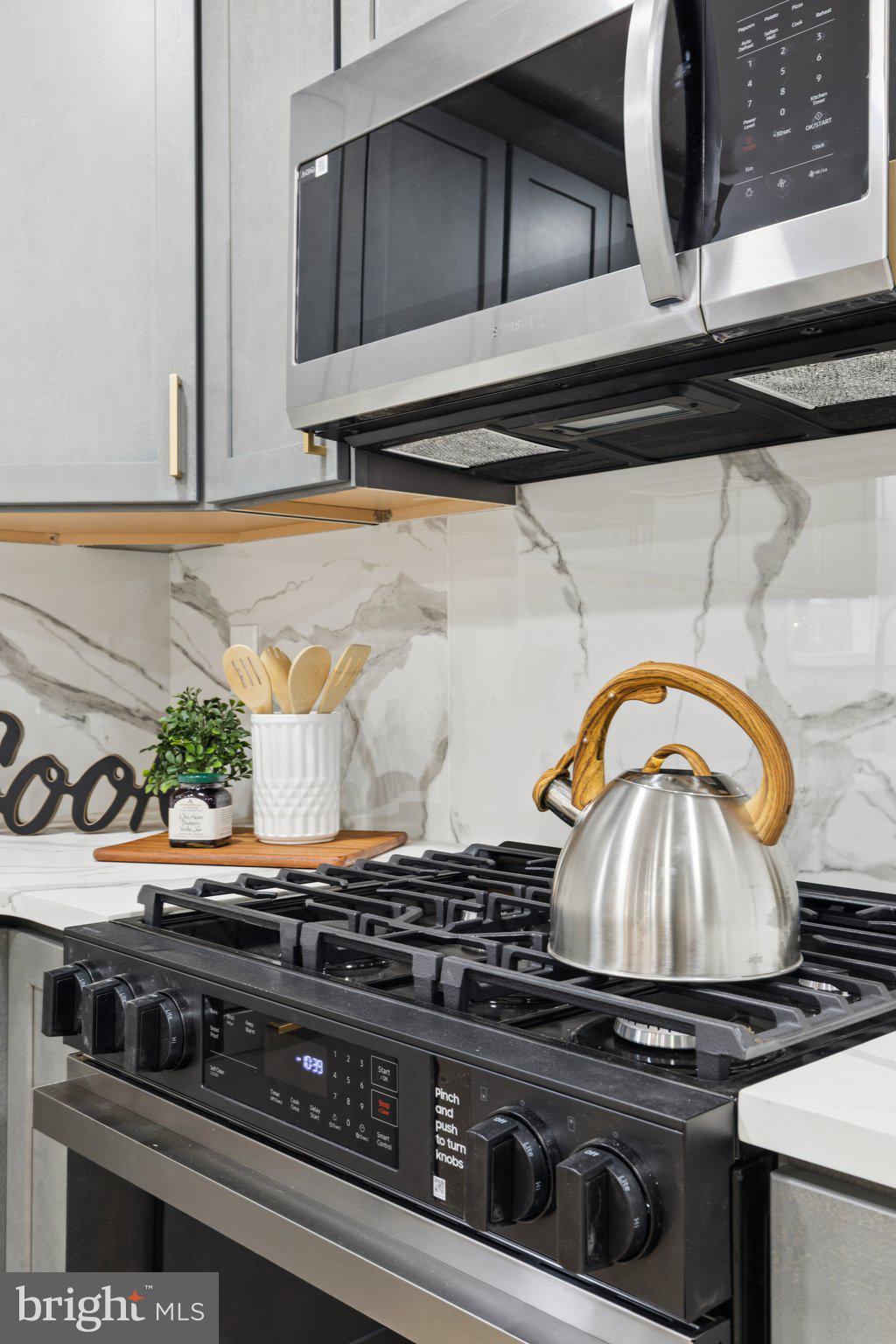 125 West Summit Avenue Haddonfield, NJ 08033 - Photo 26 of 68 a stove top oven sitting inside of a kitchen