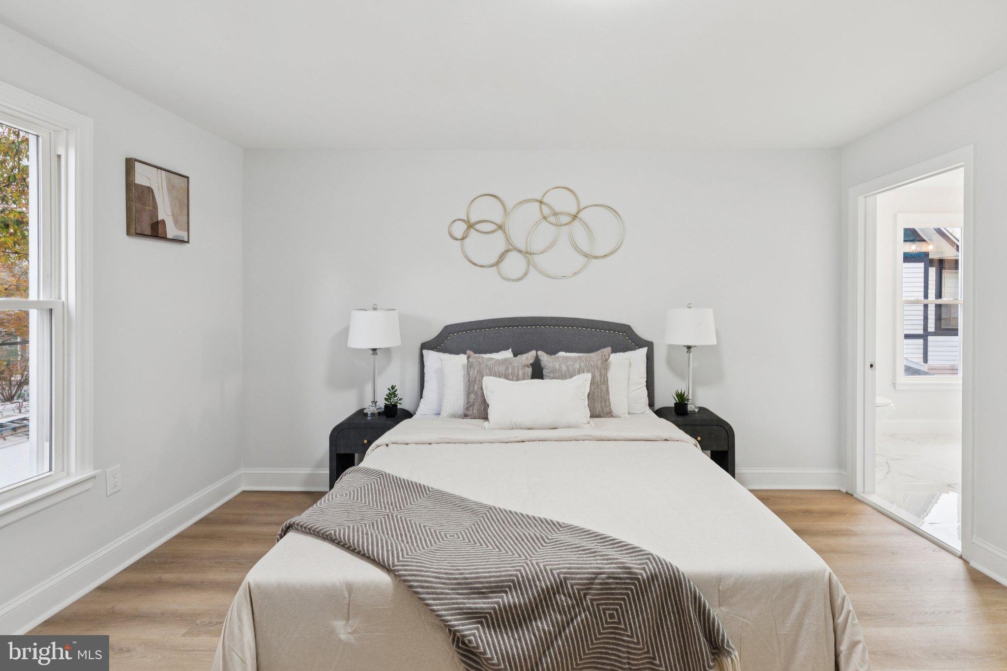 125 West Summit Avenue Haddonfield, NJ 08033 - Photo 33 of 68 a bedroom with a bed and a window