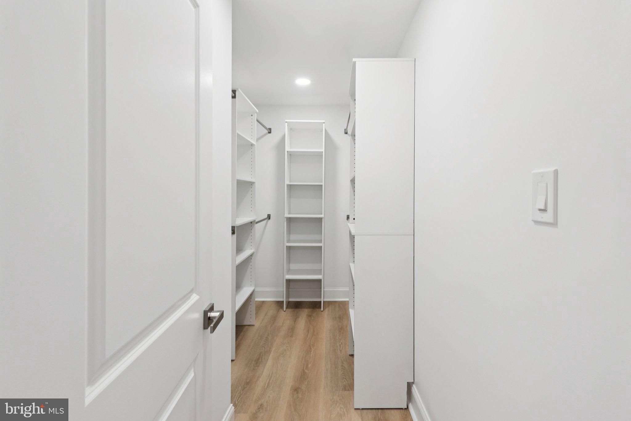 125 West Summit Avenue Haddonfield, NJ 08033 - Photo 39 of 68 a view of walk in closet with empty racks