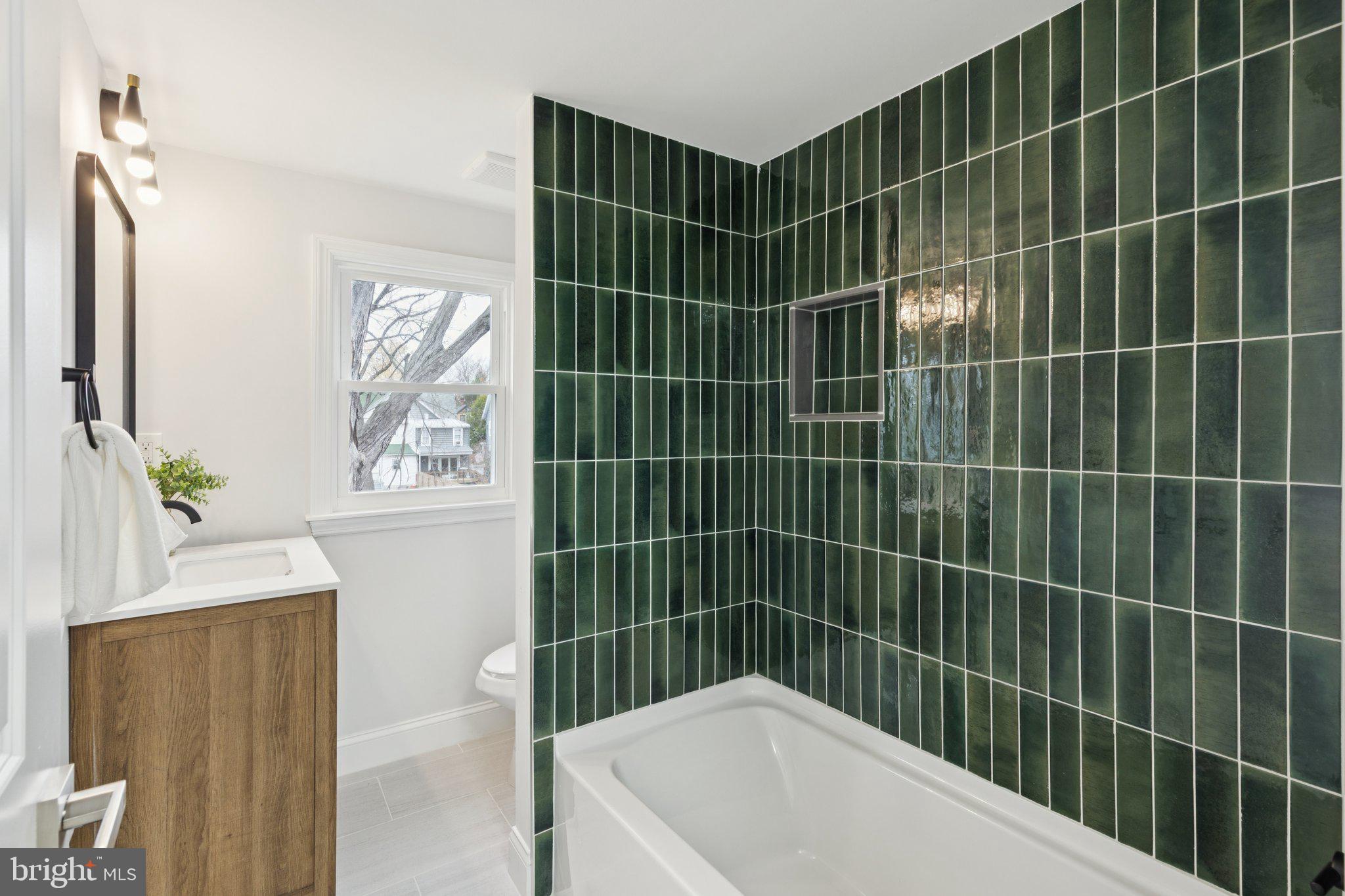 125 West Summit Avenue Haddonfield, NJ 08033 - Photo 42 of 68 a bathroom with a bathtub and a shower