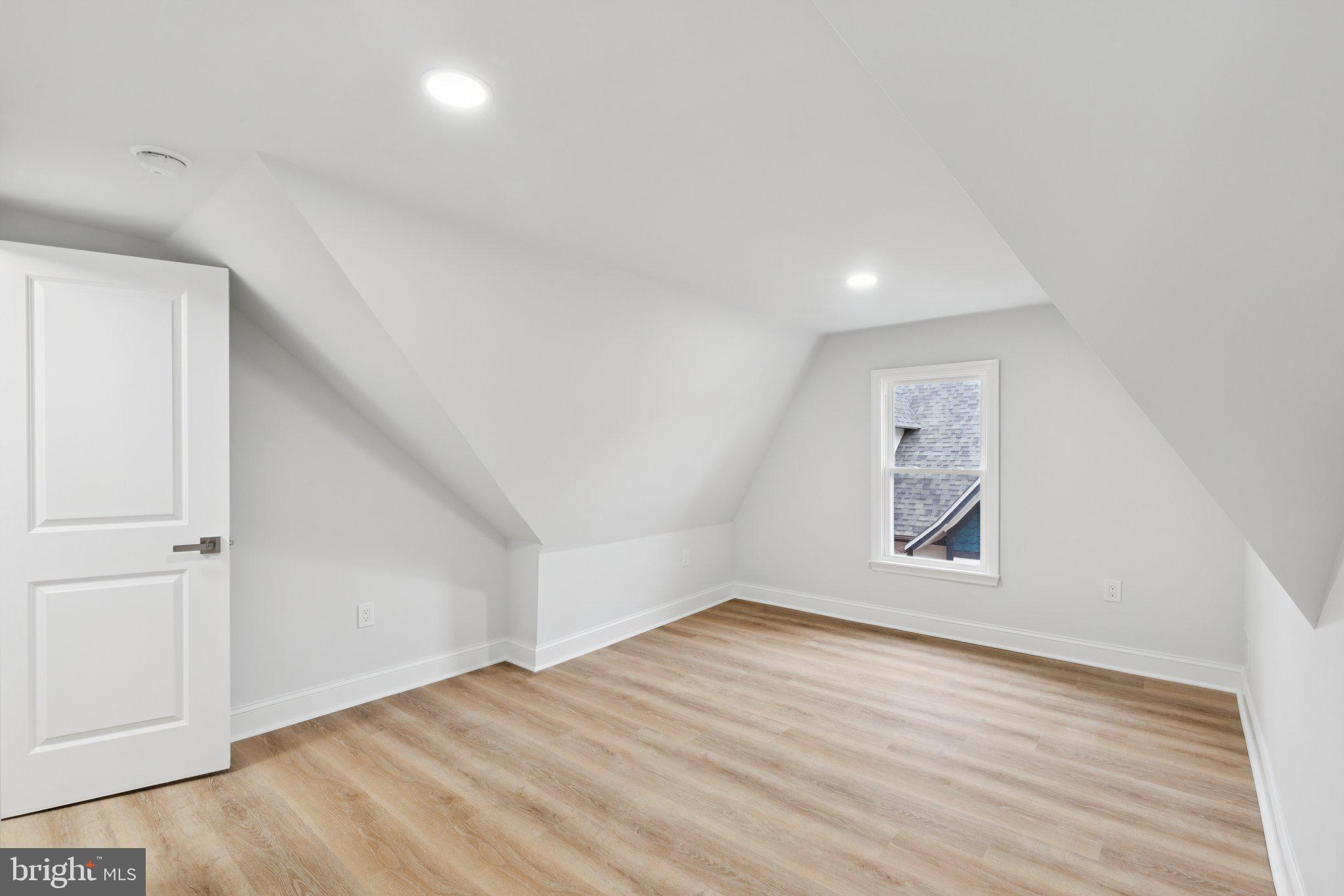 125 West Summit Avenue Haddonfield, NJ 08033 - Photo 46 of 68 an empty room with wooden floor and windows