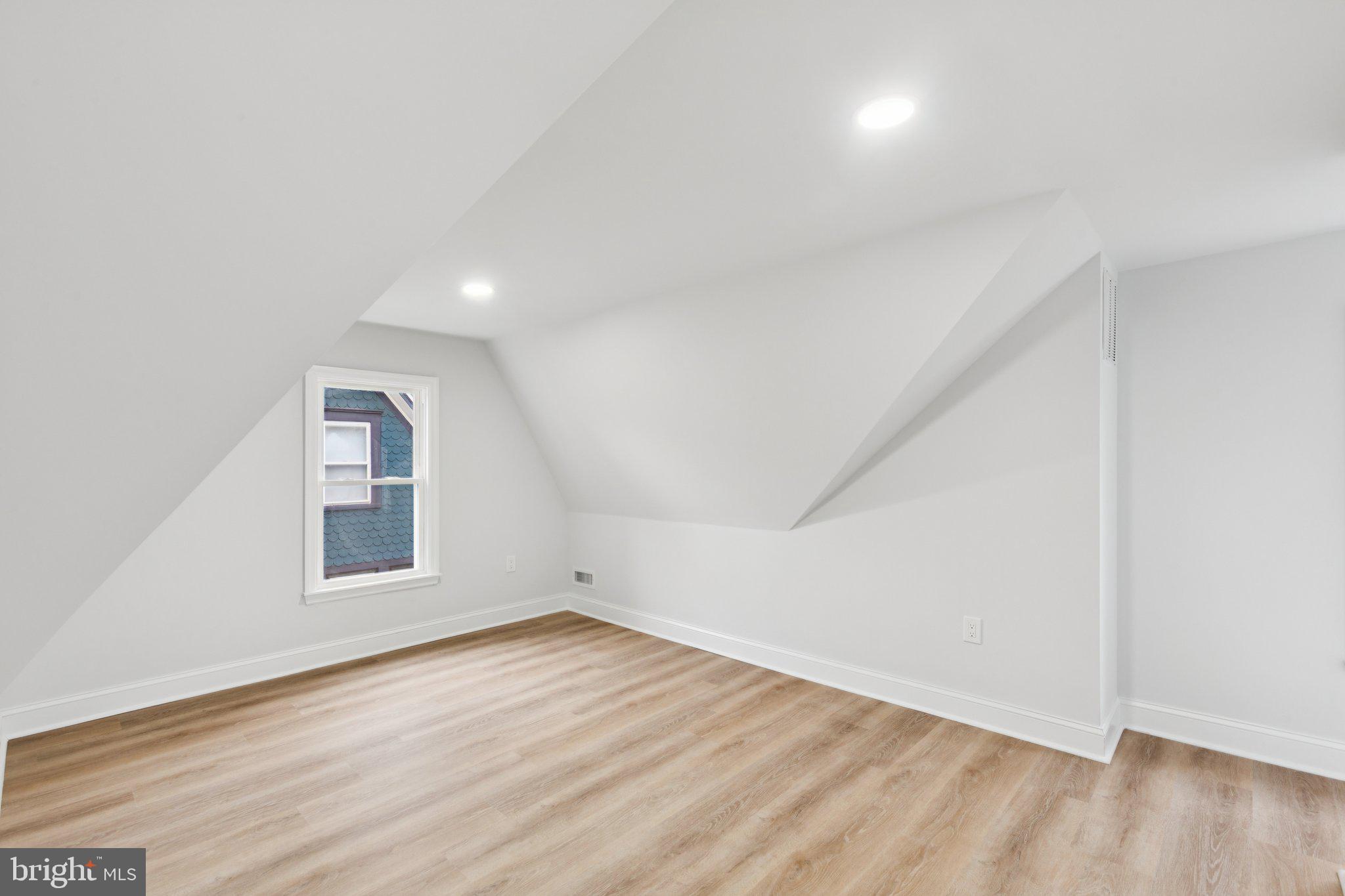 125 West Summit Avenue Haddonfield, NJ 08033 - Photo 47 of 68 an empty room with wooden floor and windows