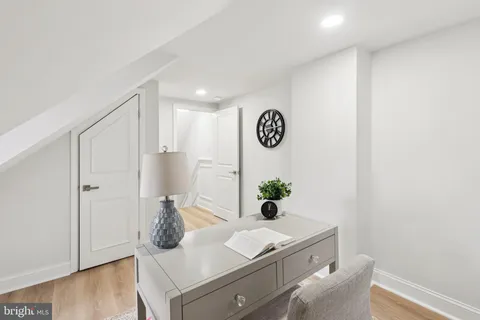 a house with trees in front of it