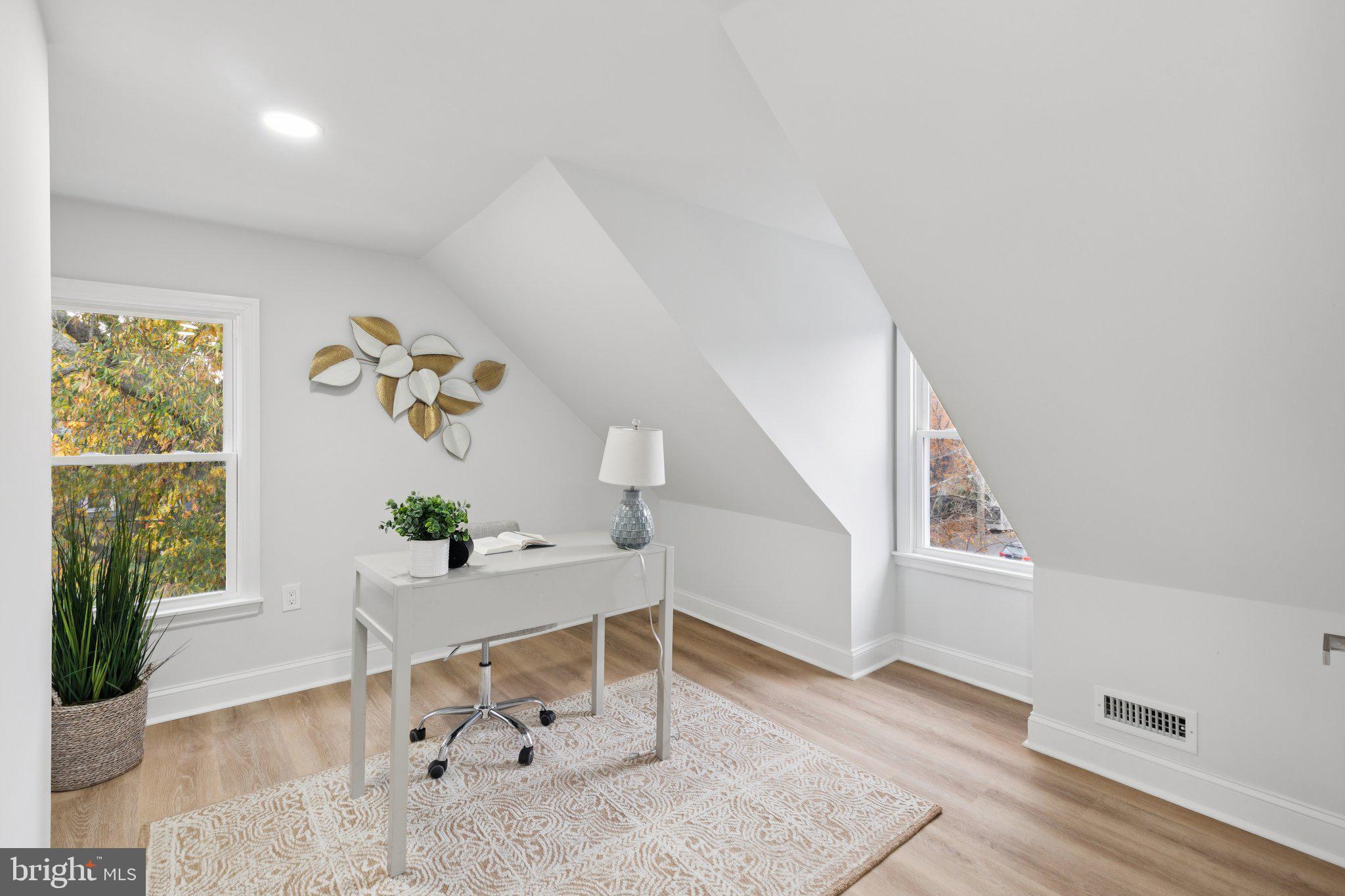 125 West Summit Avenue Haddonfield, NJ 08033 - Photo 51 of 68 a living room with furniture and a window