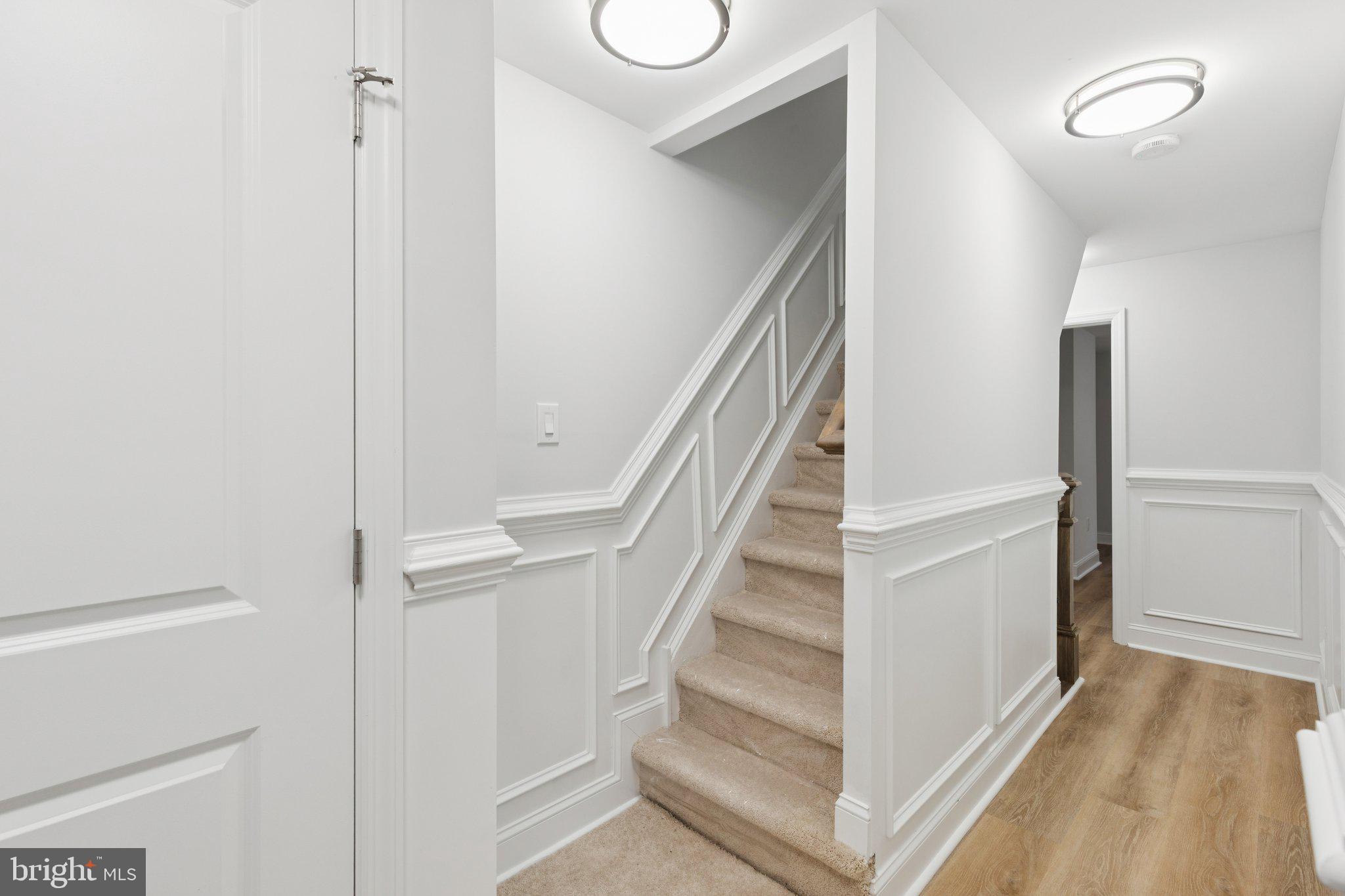 125 West Summit Avenue Haddonfield, NJ 08033 - Photo 52 of 68 a view of staircase with white walls and railing