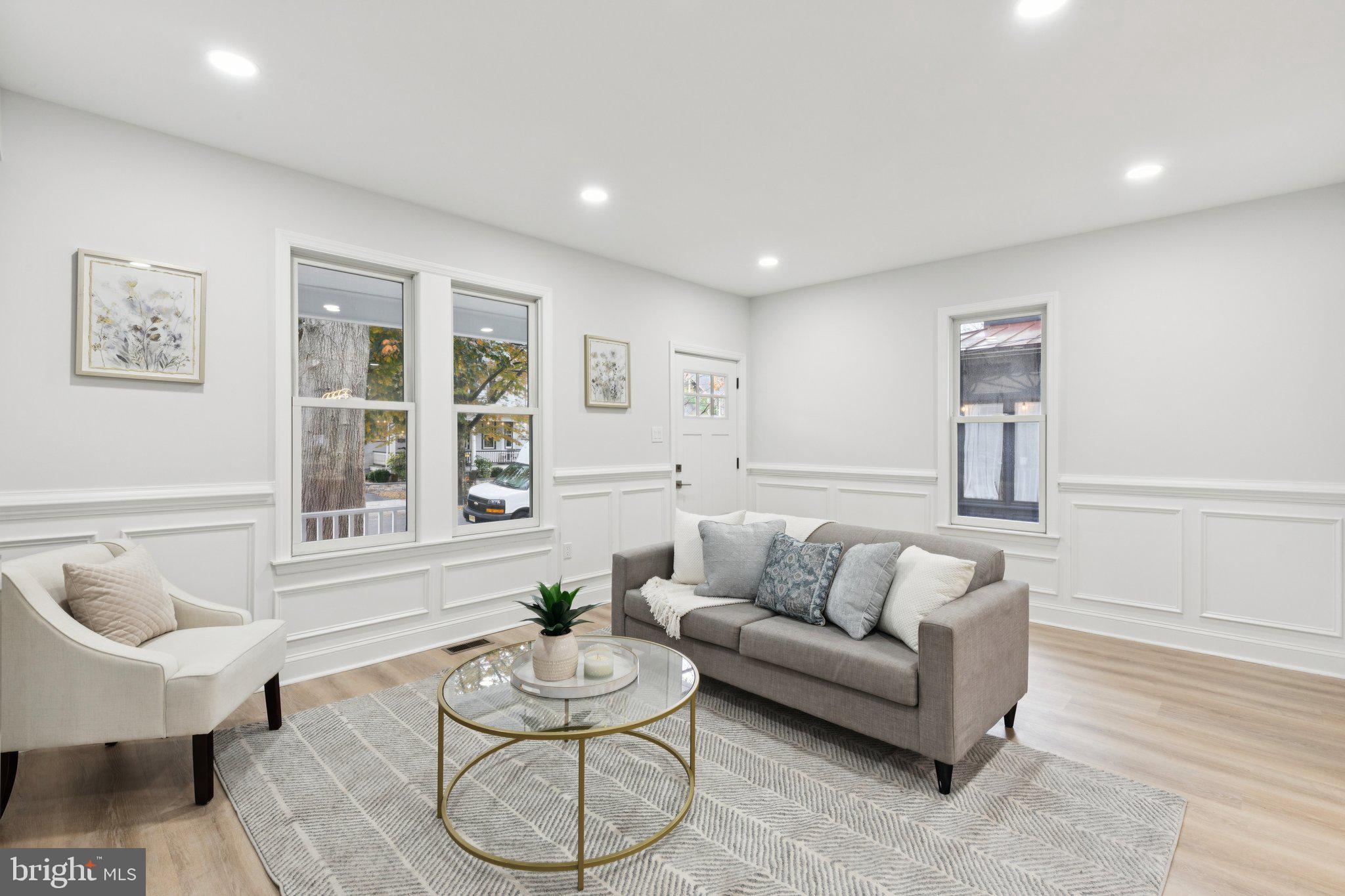 125 West Summit Avenue Haddonfield, NJ 08033 - Photo 10 of 68 a living room with furniture and a potted plant