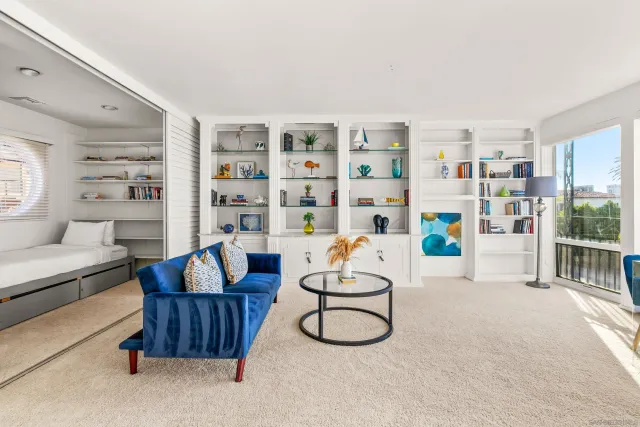 a view of a living room and a window