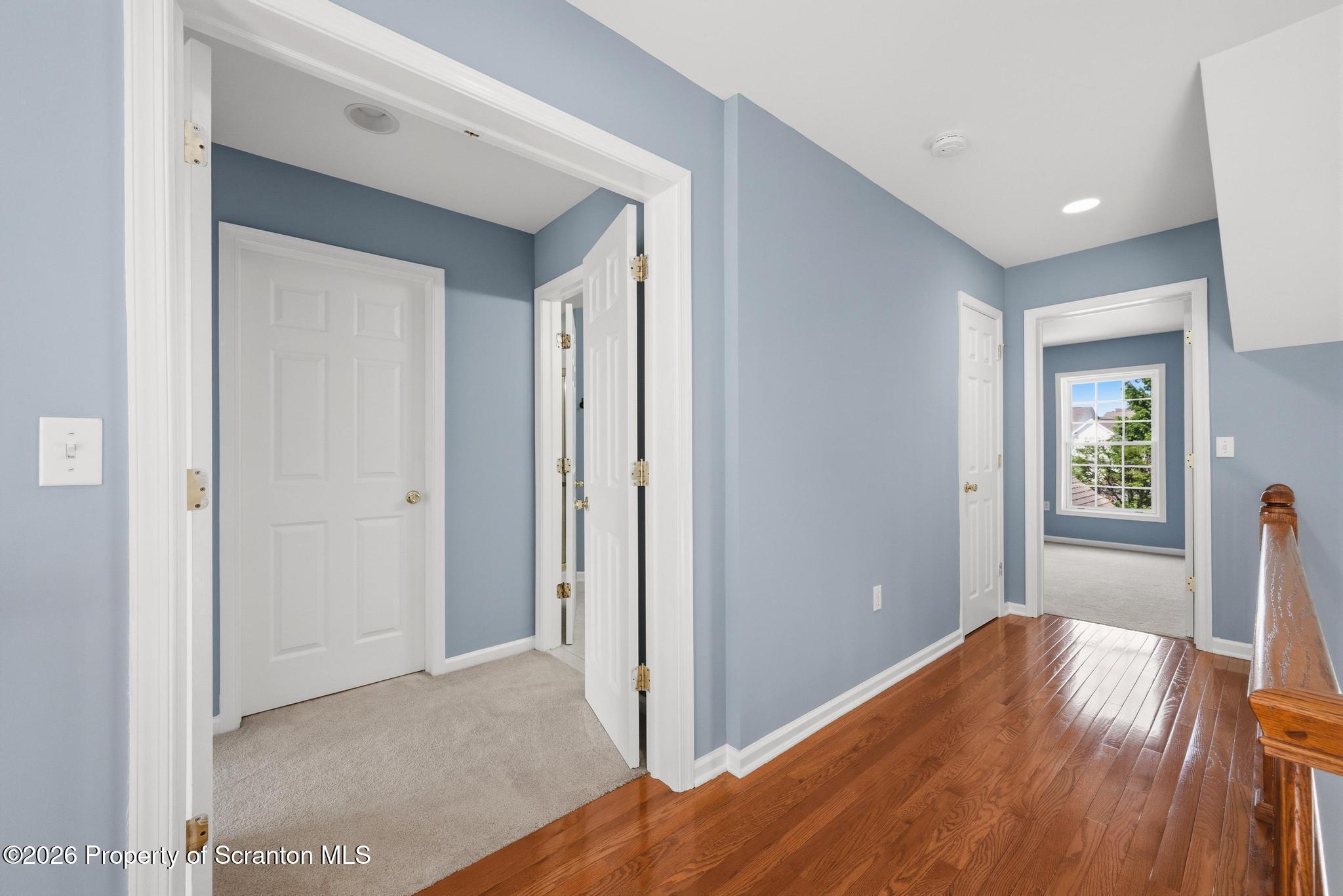 1502 Verne Cl Moosic, PA 18507 - Photo 19 of 46 a view of a big room with windows and wooden floor