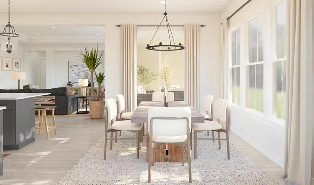 a dining room with furniture and window