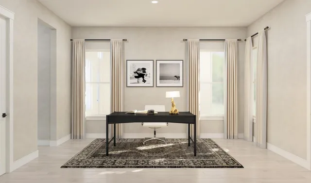 a view of a livingroom with furniture and window