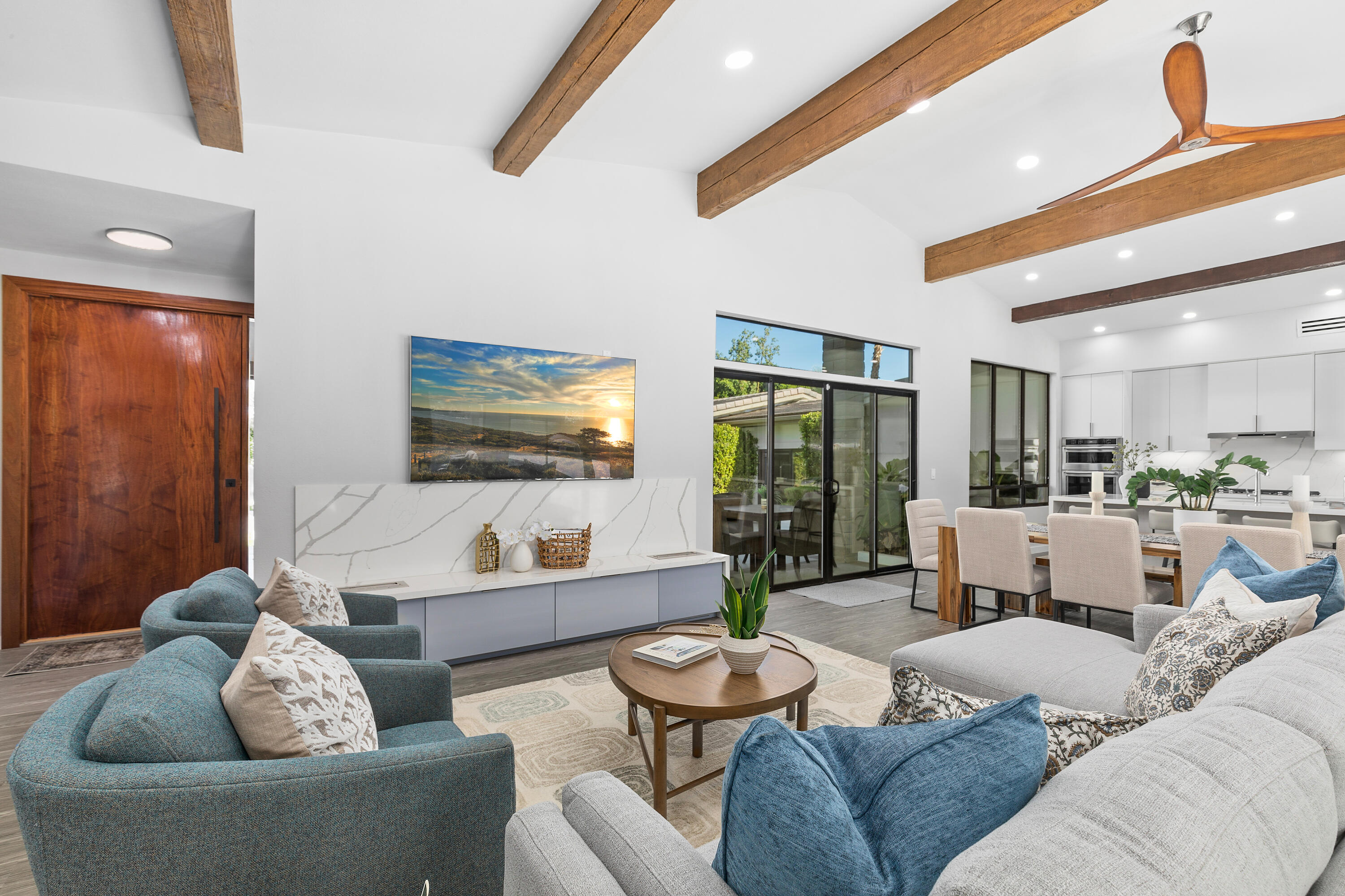 74155 Mockingbird Trail Indian Wells, CA 92210 - Photo 15 of 55 a living room with furniture and a large window