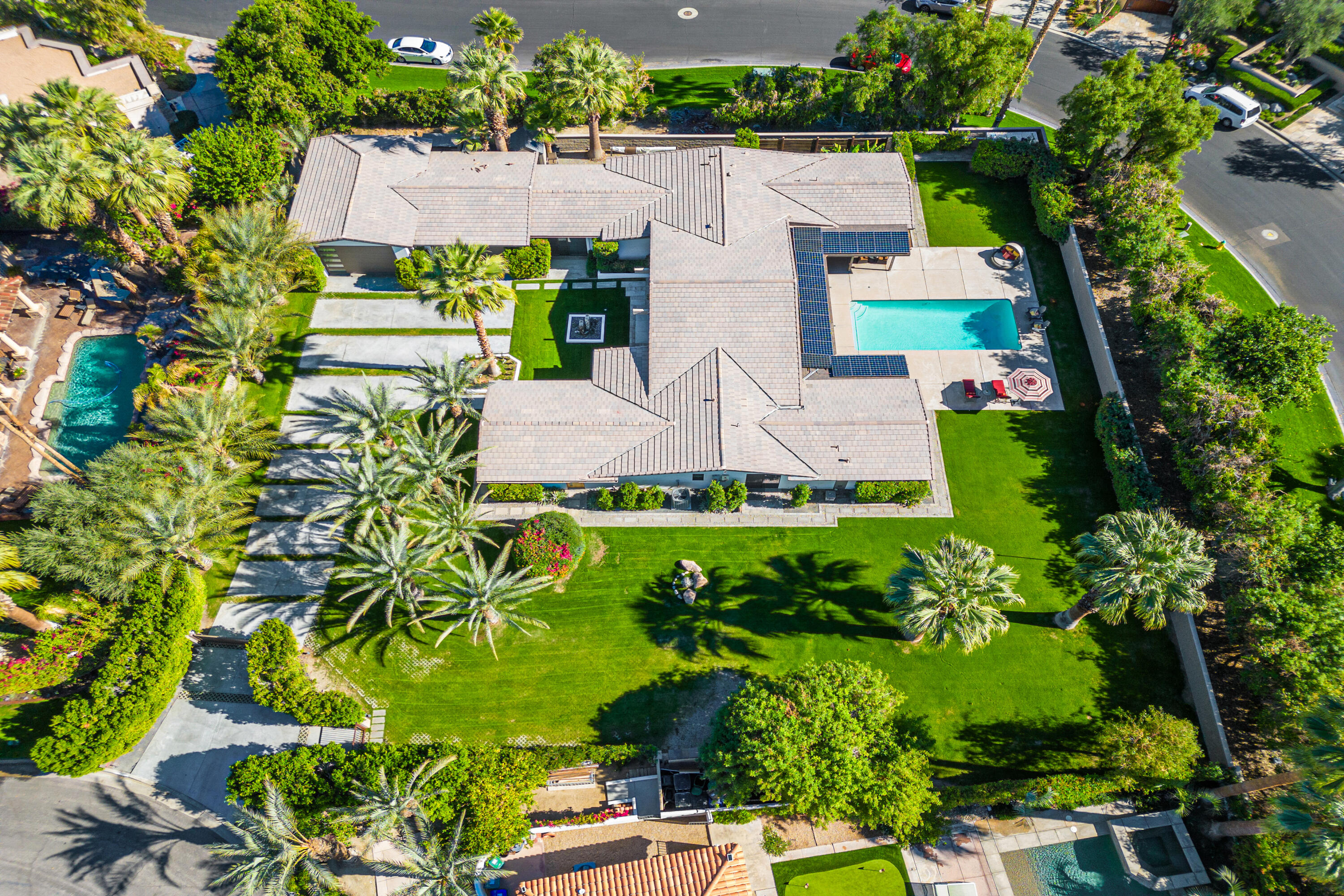 74155 Mockingbird Trail Indian Wells, CA 92210 - Photo 2 of 55 an aerial view of house with yard