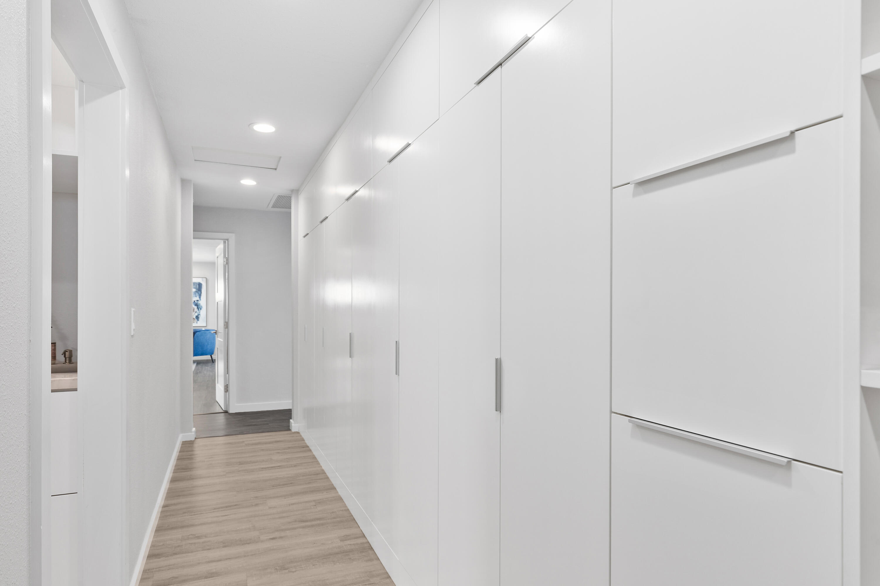 74155 Mockingbird Trail Indian Wells, CA 92210 - Photo 21 of 55 a view of a hallway with wooden floor