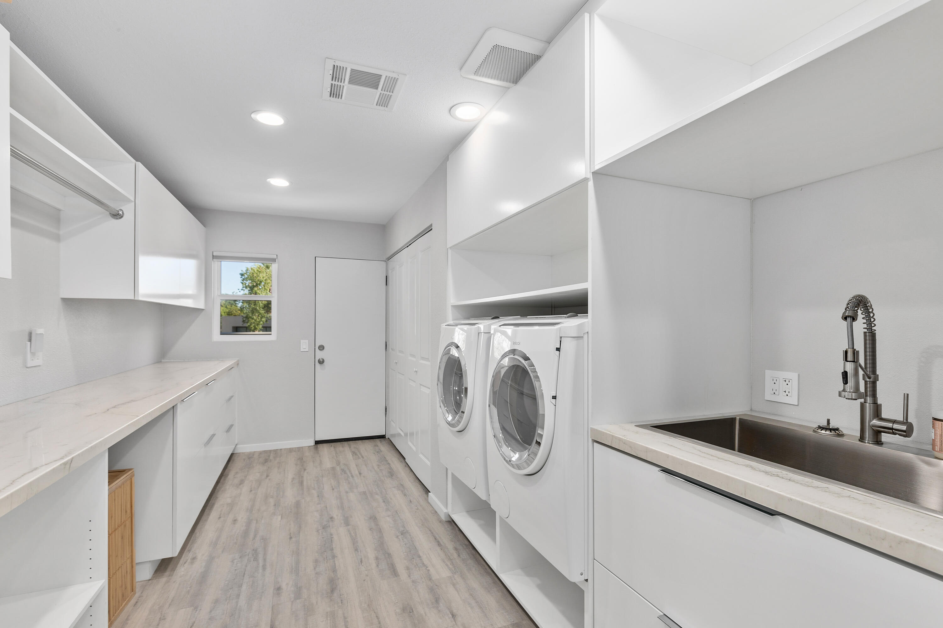 74155 Mockingbird Trail Indian Wells, CA 92210 - Photo 34 of 55 a view of a kitchen with a sink washer and dryer
