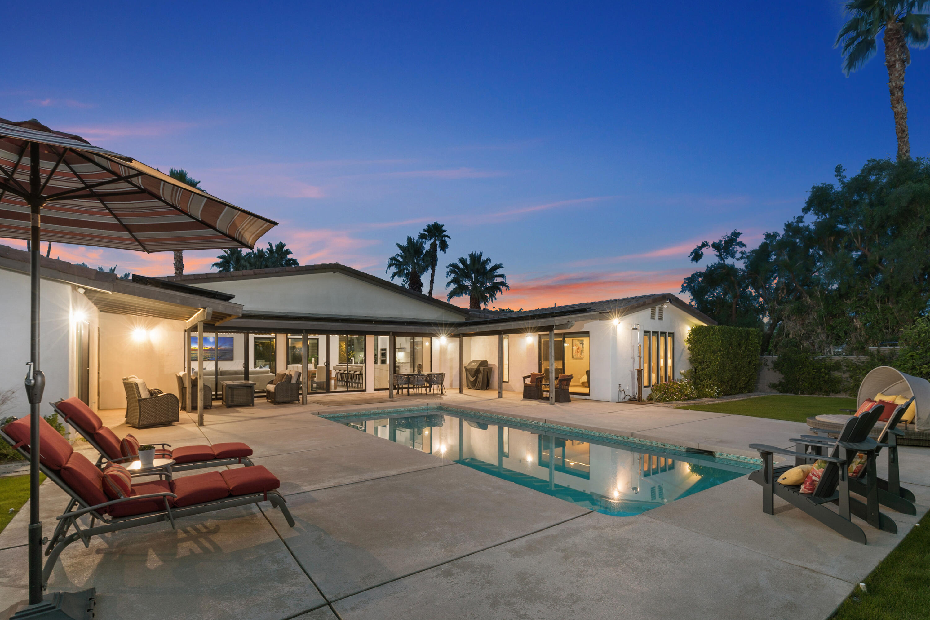 74155 Mockingbird Trail Indian Wells, CA 92210 - Photo 51 of 55 a view of a house with backyard porch and sitting area