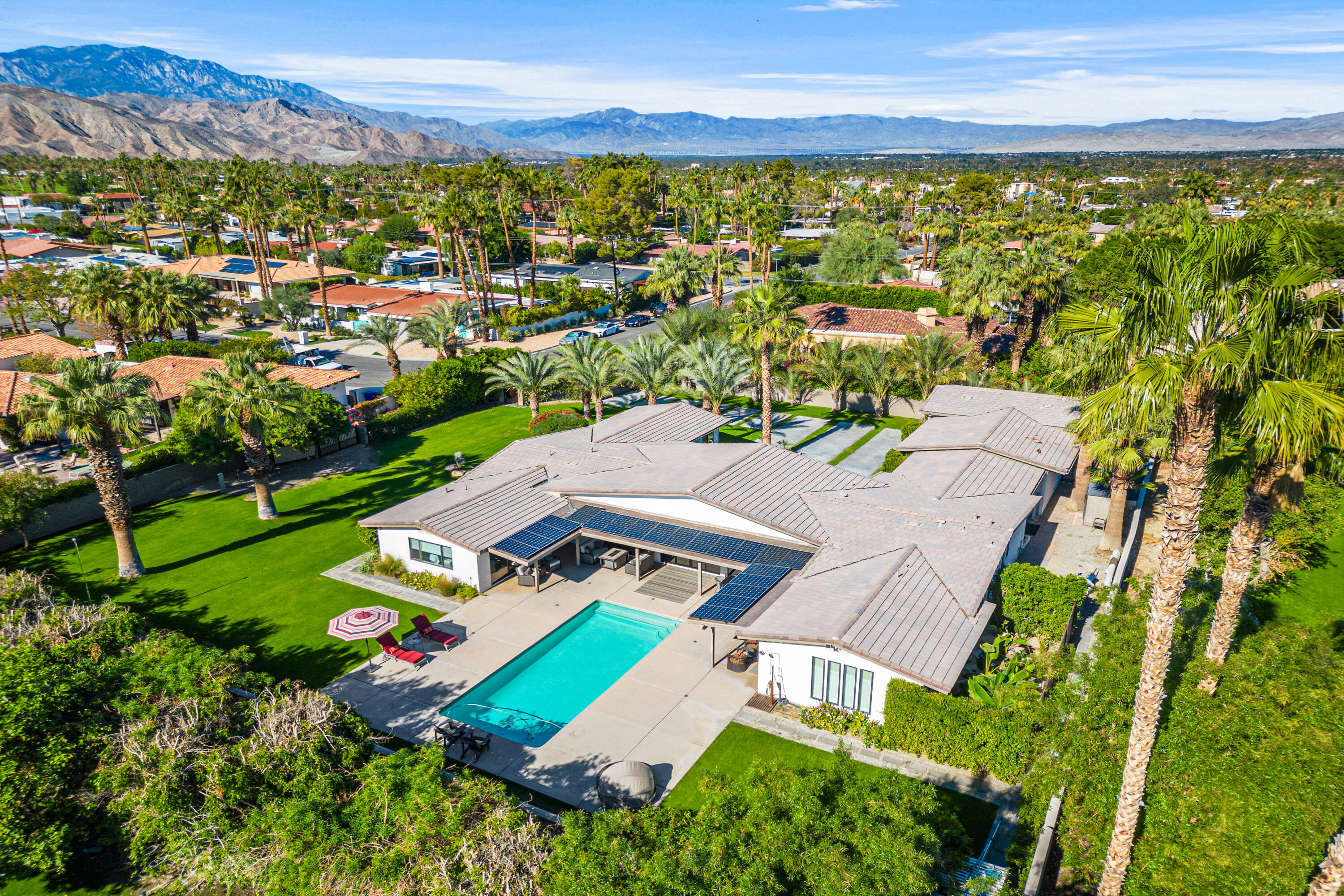 74155 Mockingbird Trail Indian Wells, CA 92210 - Photo 8 of 55 an aerial view of residential houses with outdoor space and street view