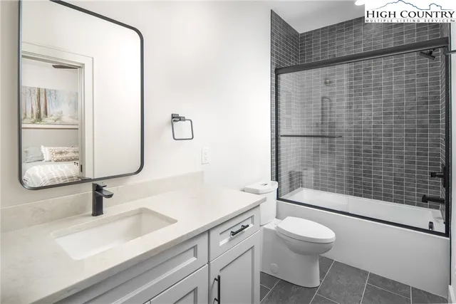 a view of a hallway with washer and dryer