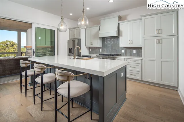 a en suite bathroom with a sink and a mirror