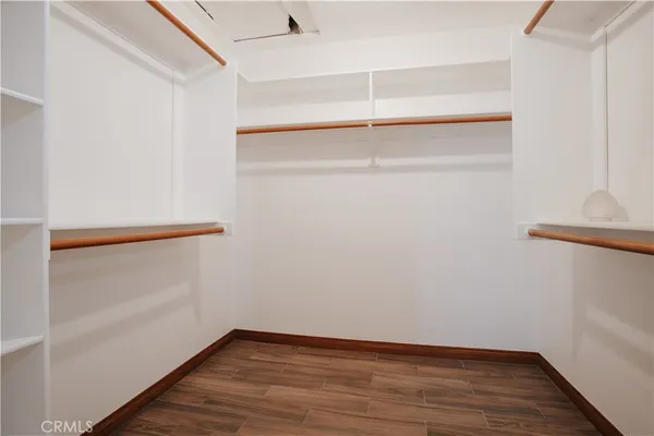 a view of an empty walk in closet